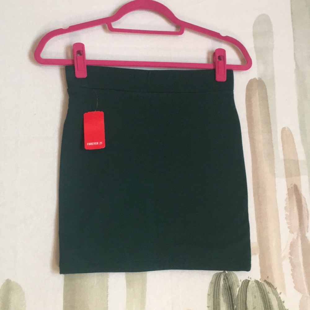 Dark green mini skirt